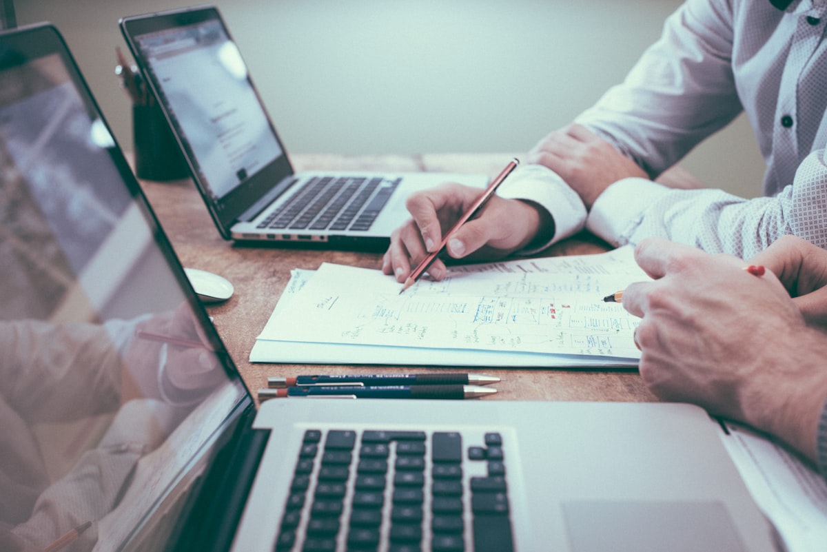 Investor reviewing real estate deal documents